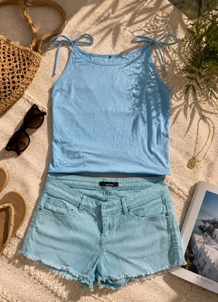 Set donna azzurro con top e shorts